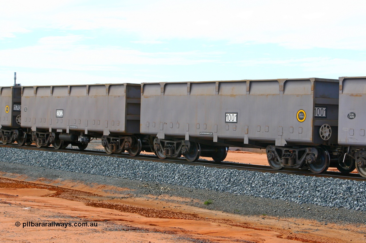 080620 2648
Boodarie, FMG's lowest numbered waggon pair, 1001 [slave] - 2002 [master], on a loaded arriving at the port around the 5 km curve. This was the second set numbered 1001 - 2002, as the original all flat sided pair went on to become a compressor set. Built by CSR Zhuzhou, China in 2007. June 20, 2008.
Keywords: 1001-2002;CSR-Zhuzhou-Rolling-Stock-Works-China;CRRC-Yangtze;FMG-ore-waggon