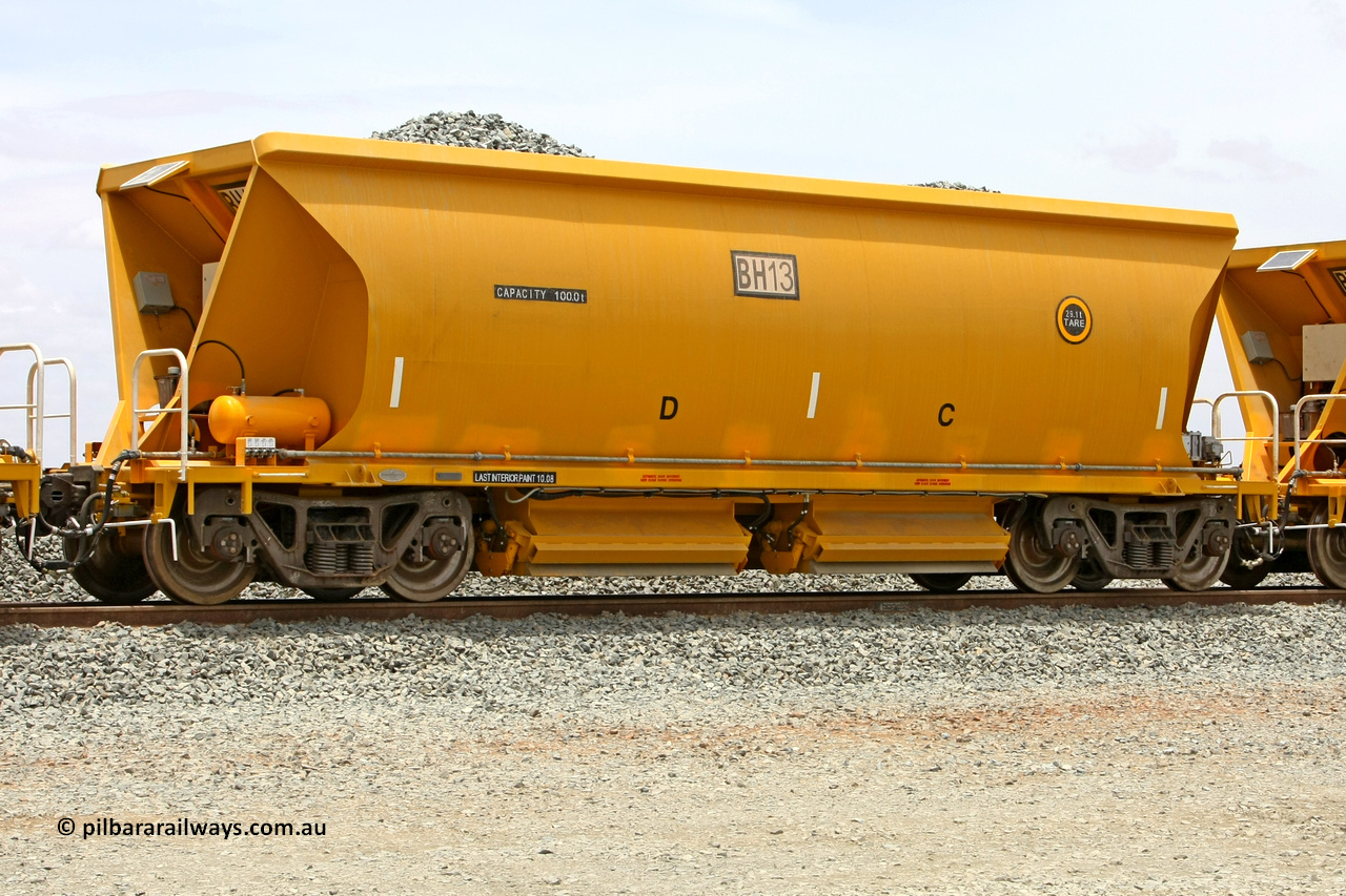 081225 0545
Barker Siding, one of FMG's thirty five ballast waggons, BH 13, 100 tonne capacity, built in China by CSR at the Yangtze Rolling Stock Company in 2008. December 25, 2008.
Keywords: BH13;CSR-Yangtze-Rolling-Stock-Co-China;FMG-ballast-waggon;