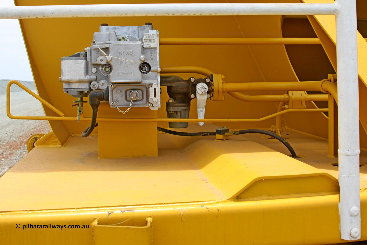 081225 0570
Barker Siding, one of FMG's thirty five ballast waggons, BH 11, EP-60 brake valve and manual release view, 100 tonne capacity, built in China by CSR at the Yangtze Rolling Stock Company in 2008. December 25, 2008.
Keywords: BH11;CSR-Yangtze-Rolling-Stock-Co-China;FMG-ballast-waggon;