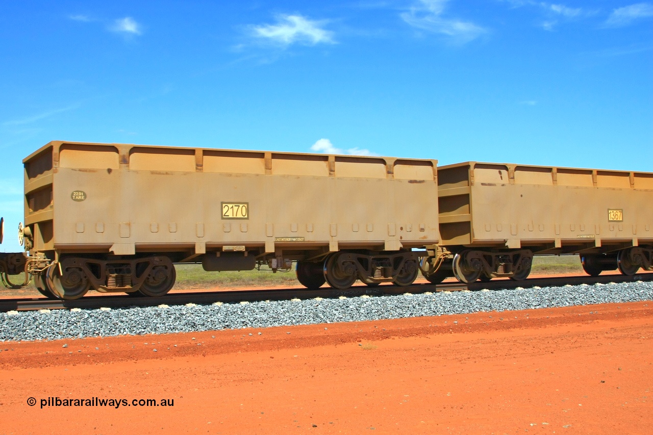 090121 1200
Boodarie, an FMG empty train with mismatched waggon pair slave 1367 22.6 tonnes tare and control 2170 22.9 tonne tare from the original CSR Zhuzhou Rolling Stock Works in China build from 2007.
Keywords: 1367-2170;CSR-Zhuzhou-Rolling-Stock-Works-China;FMG-ore-waggon;