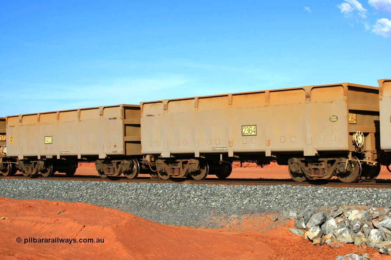 090121 1672
Boodarie, an FMG empty train departs the port with mismatched waggon pair slave 1403 22.6 tonnes tare and control 2364 22.9 tonne tare from the original CSR Zhuzhou Rolling Stock Works in China build from 2007.
Keywords: 1403-2364;CSR-Zhuzhou-Rolling-Stock-Works-China;FMG-ore-waggon;