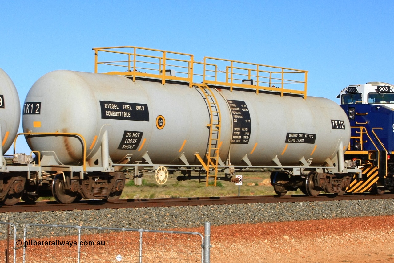 110620 2272
Chapman, FMG TK type fuel tank waggon TK 12 built by China Southern CSR at their Zhuzhou Rolling Stock Works plant in China in 2008 as the final member of a order for twelve tanks, is on the loaded fuel train to Cloud Break. 20th June 2011.
Keywords: TK12;TK-type;CSR-Zhuzhou-Rolling-Stock-Works-China;FMG-tank-waggon;