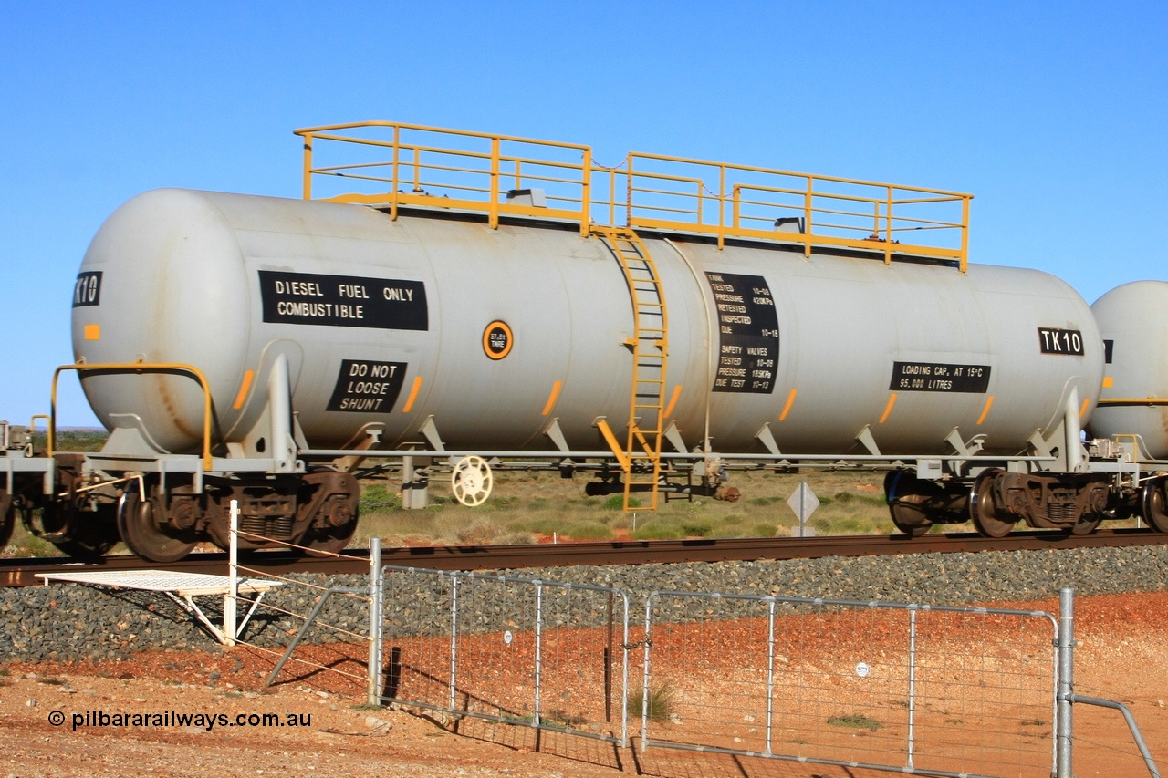 110620 2274
Chapman, FMG TK type fuel tank waggon TK 10 built by China Southern CSR at their Zhuzhou Rolling Stock Works plant in China in 2008 as part of an order for twelve tanks, is on the loaded fuel train to Cloud Break. 20th June 2011.
Keywords: TK10;TK-type;CSR-Zhuzhou-Rolling-Stock-Works-China;FMG-tank-waggon;