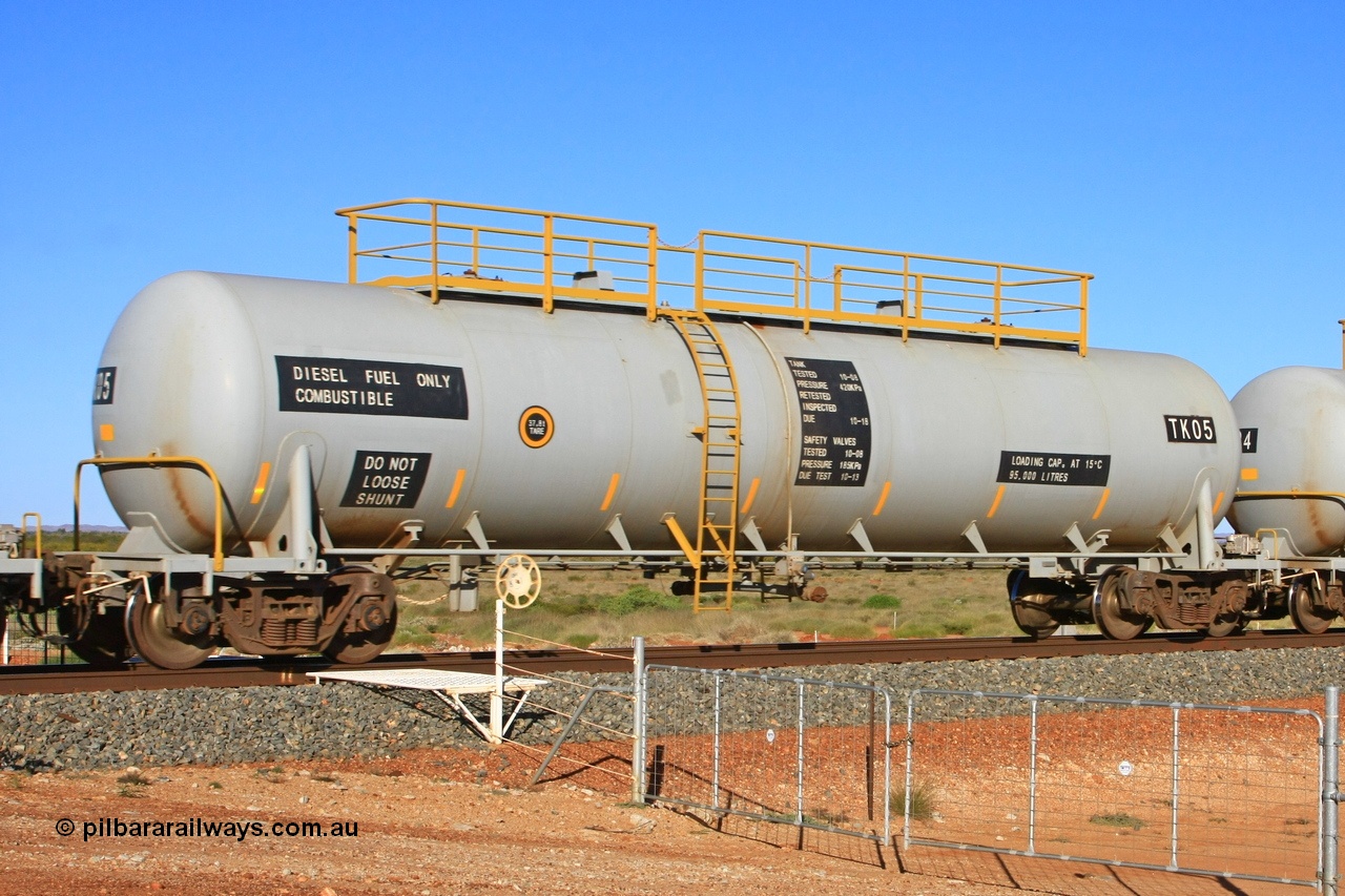 110620 2277
Chapman, FMG TK type fuel tank waggon TK 05 built by China Southern CSR at their Zhuzhou Rolling Stock Works plant in China in 2008 as part of an order for twelve tanks, is on the loaded fuel train to Cloud Break. 20th June 2011.
Keywords: TK05;TK-type;CSR-Zhuzhou-Rolling-Stock-Works-China;FMG-tank-waggon;