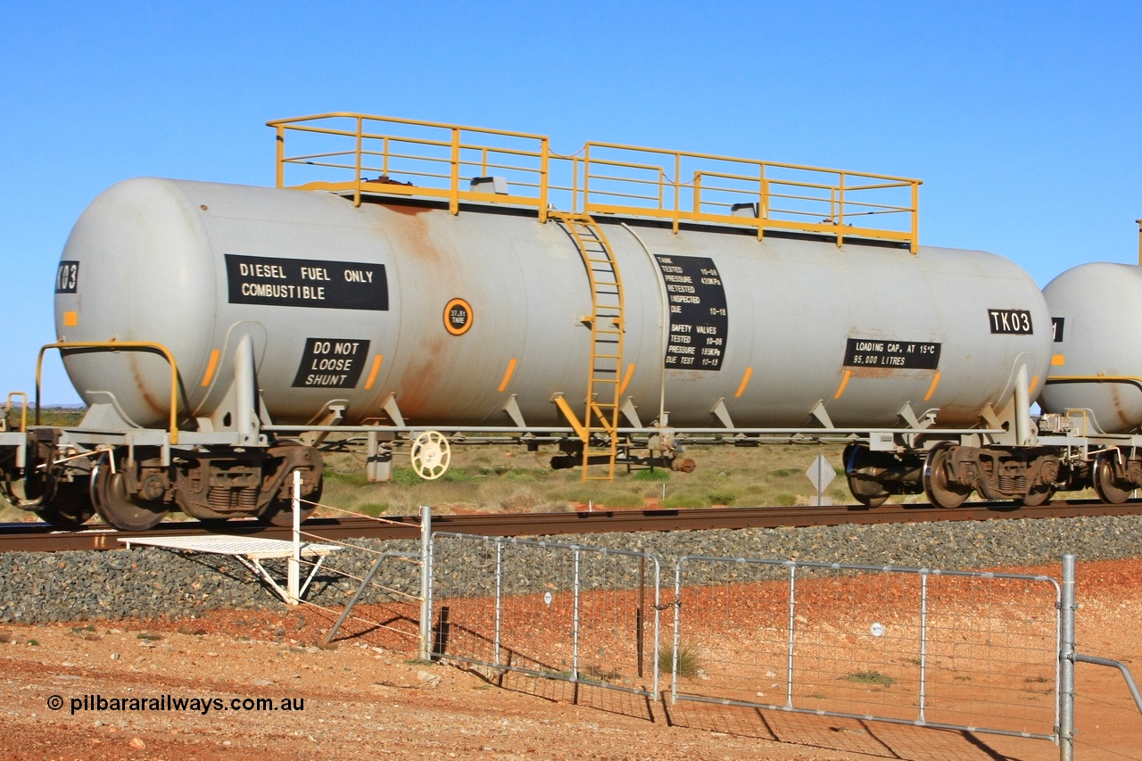 110620 2282
Chapman, FMG TK type fuel tank waggon TK 03 built by China Southern CSR at their Zhuzhou Rolling Stock Works plant in China in 2008 as part of an order for twelve tanks, is on the loaded fuel train to Cloud Break. 20th June 2011.
Keywords: TK03;TK-type;CSR-Zhuzhou-Rolling-Stock-Works-China;FMG-tank-waggon;