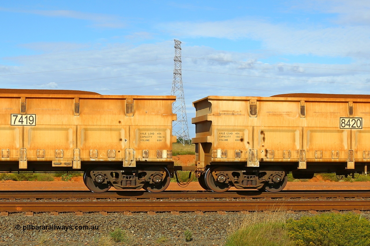 200412 5554cr
Boodarie, part of an FMG loaded train CNR (China Northern) QRRS (Qiqihar Rolling Stock Works) built waggon pair 7419 slave waggon and 8420 control waggon, crop of the waggon details of AXLE LOAD 45 t, CAPACITY 156.1 t, VOLUME 69m³. 12th April 2020.
Keywords: 7419-8420;CNR-QRRS-China;FMG-ore-waggon;