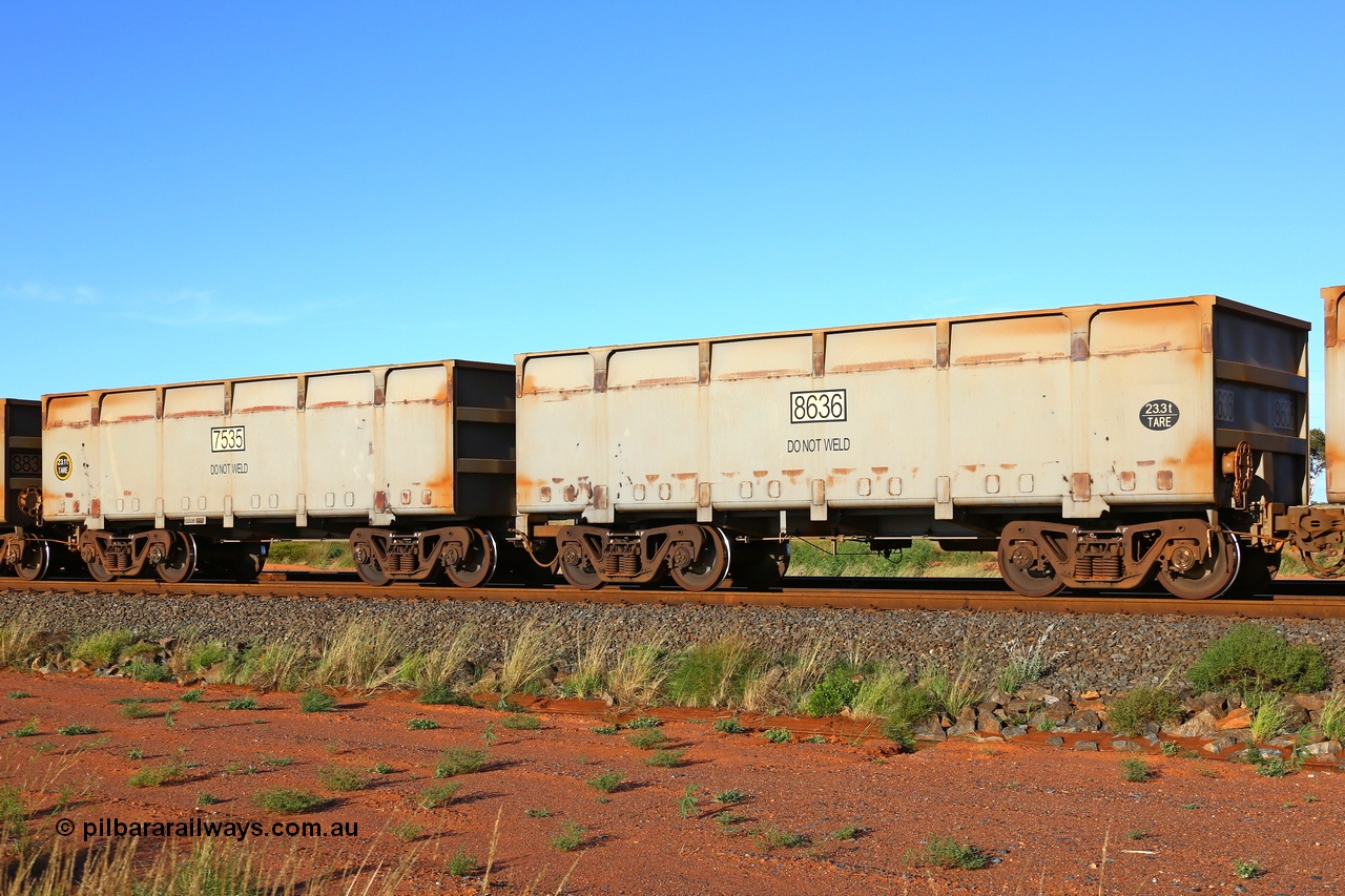 200412 6069
Boodarie, part of a loaded FMG train, a mismatched waggon pair, both are CRRC Yangtze Rolling Stock Co. of China builds, 7535 is a slave waggon with rotary coupler and 23.1 tonne tare and carrying the wrong number as it should be 7635, coupled to control waggon 8636 23.3 tonnes tare. Earlier on the same day I saw another 7535 coupled to a 8536. Both should be 2018 builds. 12th April 2020.
Keywords: 7535-8636;CRRC-Yangtze-Rolling-Stock-Co-China;FMG-ore-waggon;