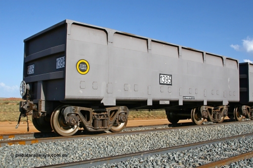 01395 080116 1371
Chapman Siding 69 km, FMG slave waggon 1395 tare 22.6 tonnes with rotary coupler built by China Southern or CSR at their Zhuzhou Rolling Stock Works in China during 2007, stands on the passing track. 16th January 2008.
Keywords: 1395;CSR-Zhuzhou-Rolling-Stock-Works-China;FMG-ore-waggon;