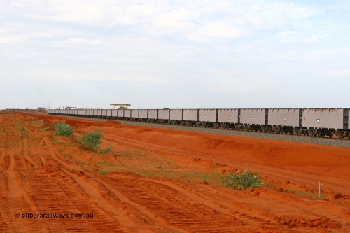 01347 080304 2170
Thomas Yard, down the rail welding end, rake of waggons built by China Southern or CSR at their Zhuzhou Rolling Stock Works in China in 2007 with the welding yard behind them. 4th March 2008.
Keywords: 1347;CSR-Zhuzhou-Rolling-Stock-Works-China;FMG-ore-waggon;