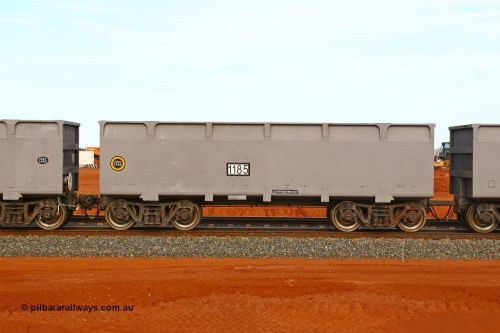 01185 080304 2184
Thomas Yard, down the rail welding end, side view of slave waggon 1185, the yellow circle around the tare weight 22.6 t indicates the rotary coupler end, built by China Southern or CSR at their Zhuzhou Rolling Stock Works in China in 2007. 4th March 2008.
Keywords: 1185;CSR-Zhuzhou-Rolling-Stock-Works-China;FMG-ore-waggon;