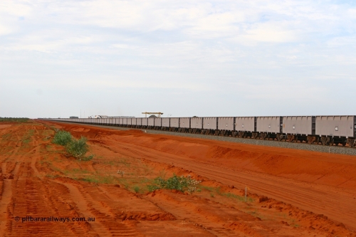 01279-02280 080304 2193
Thomas Yard, looking north, long rake of waggons being run up and down the mainline to keep the wheels turning. 4th March 2008.
Keywords: FMG-ore-waggon;