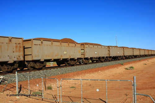 01653 110620 2261
Chapman, FMG loaded train with 1653 slave waggon and control waggon of the following pair 2892, Chinese built ore waggons by CSR Zhuzhou Rolling Stock Works loaded with lump ore. June 20, 2011.
Keywords: 1653;CSR-Zhuzhou-Rolling-Stock-Works-China;FMG-ore-waggon;