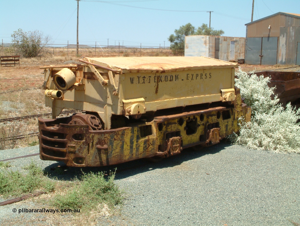 041014 122804
Pilbara Railways Historical Society, Mancha battery hauler from the former CSR underground blue asbestos mine at Wittenoom, driving position is at the rear in this shot. Shows misspelling on the side of EXPRSS rather than express. Donated to the Society in 2003. 14th October 2004.
Keywords: Mancha