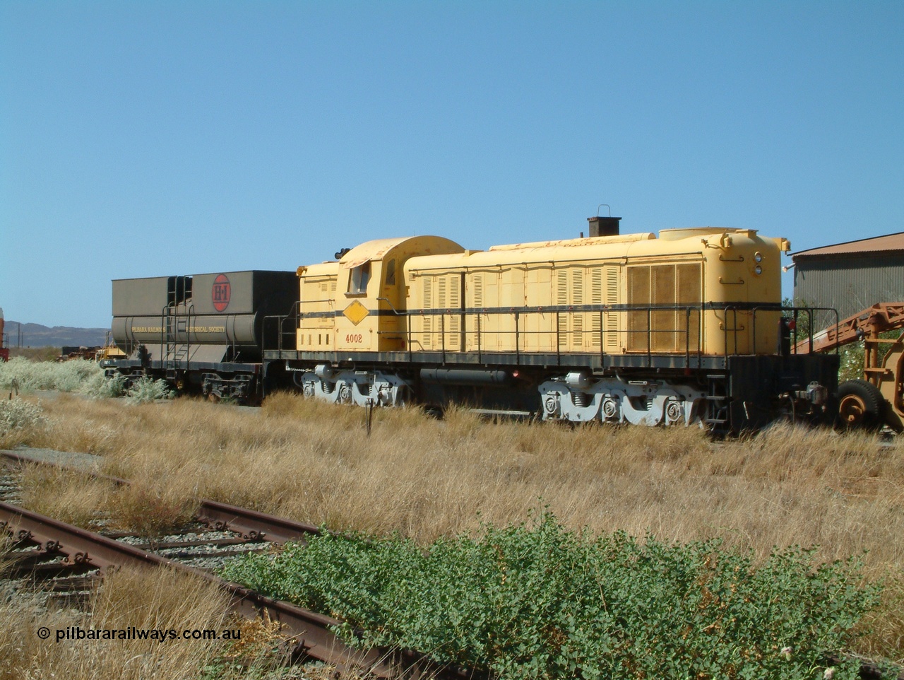 041014 142502
Pilbara Railways Historical Society museum, former Cliffs Robe River Iron Associates RSD-3 model ALCo locomotive built by Montreal Locomotive Works (MLW) in 1951 for NSWGR as the 40 class 4002 serial 77733, purchased by CRRIA in 1971 and numbered 261.002, then 1705 and finally 9405. 4002 is preserved in an operational state and another claim to fame is it run the Royal Train in NSW February 1954. Donated to the Society in 1979. 14th October 2004.
Keywords: 4002;MLW;ALCo;RSD3;77733;9405;40-class;