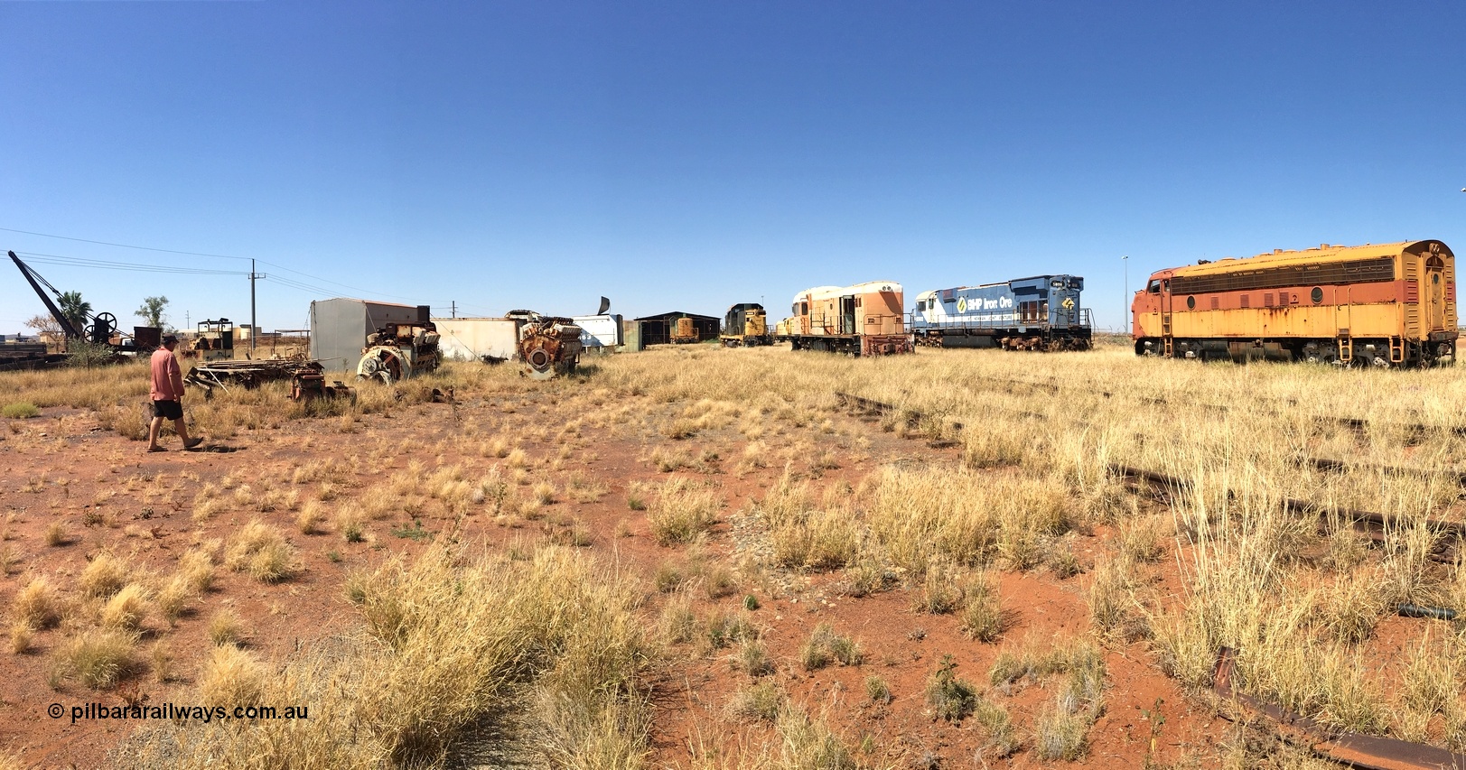 200914 iPhone IMG 8830
Pilbara Railways Historical Society, in this panorama image you can see from the left, the PWD crane, waggons and Simplex loco from Point Samson, a couple of ALCo engines, the Locotrol 'cab'; off of BHP 5663, the ALCo S2 Hamersley Iron 007 'Mabel', ALCo C415 demonstrator Hamersley Iron 1000, former NSWGR ALCo RSC-3 Robe River Iron Associates 9405 renumbered to 4002, English Electric ST95B Goldsworthy Mining 1, ALCo M636 BHP 5502 and EMD F7A Mt Newman Mining 5450. 14th September 2020.
