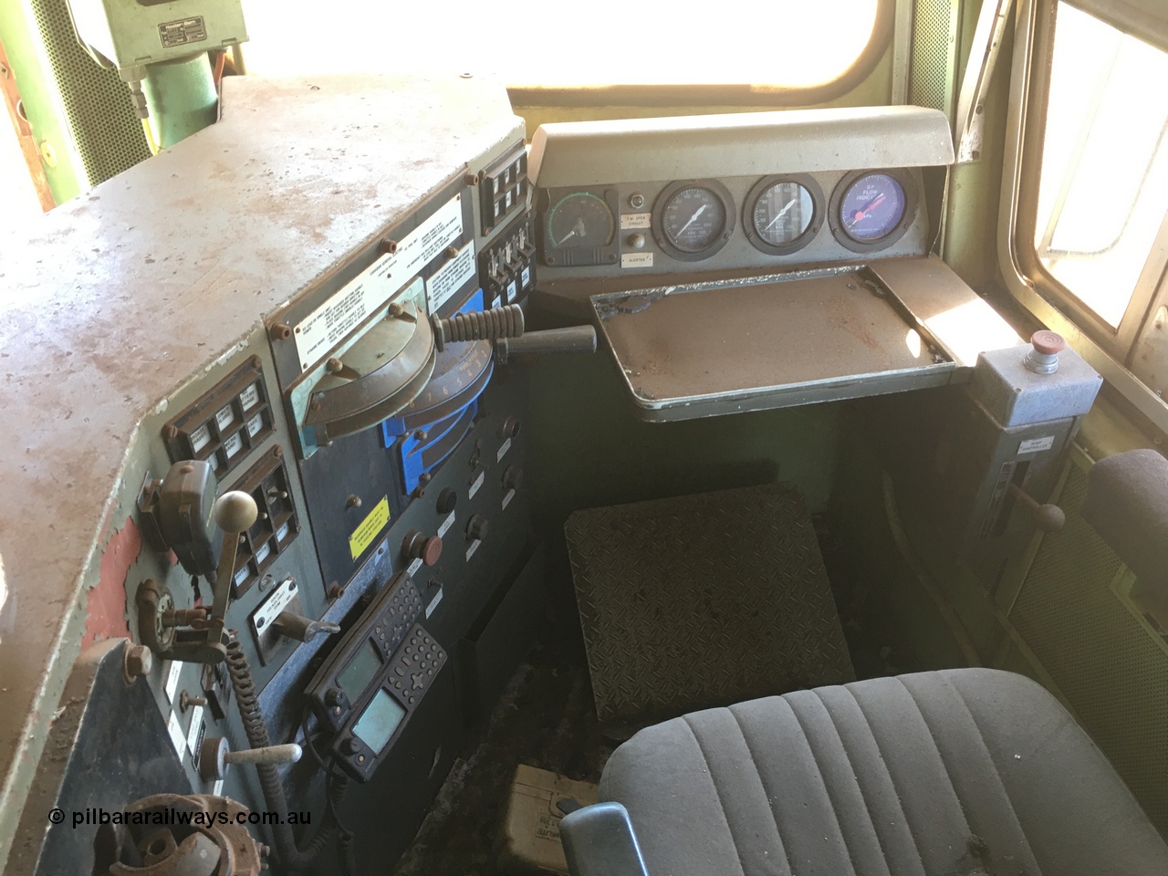 200914 iPhone IMG 8833
Pilbara Railways Historical Society, driver position view of Comeng WA ALCo rebuild C636R locomotive 3017 serial WA-135-C-6043-04. The improved Pilbara cab was fitted as part of the rebuild in April 1985. Donated to Society in 1996. 14th September 2020.
Keywords: 3017;Comeng-WA;ALCo;C636R;WA-135-C-6043-04;rebuild;