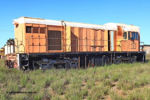 240701 2776
Pilbara Railways Historical Society, Goldsworthy Mining Ltd B class unit 1, an English Electric built ST95B model, originally built in 1965 serial A-104, due to accident damage rebuilt on new frame with serial A-232 in 1970. These units of Bo-Bo design with a 6CSRKT 640 kW prime mover and built at the Rocklea Qld plant. Donated to Society in 1995. 
Keywords: B-class;English-Electric-Qld;ST95B;A-104;A-232;GML;Goldsworthy-Mining