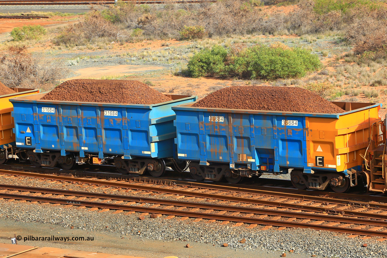 240619 0335
Cape Lambert yard, one of Rio Tinto's blue rakes with spring park brake and only electronic controlled pneumatic [ECP] braking, waggon pair 31684 is a master and is bar coupled to slave waggon 36684 built by China Northen as a Q type in 11/2022. Captured on June 19, 2024.
Keywords: 31684;36684;Q-type;China-Northern;Rio-ore-waggon;