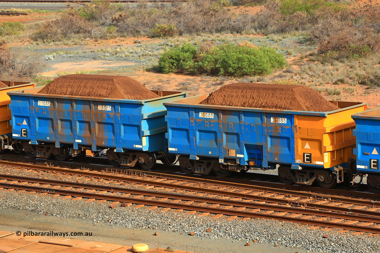 240619 0337
Cape Lambert yard, one of Rio Tinto's blue rakes with spring park brake and only electronic controlled pneumatic [ECP] braking, waggon pair 31685 is a master and is bar coupled to slave waggon 36685 built by China Northen as a Q type in 11/2022. Captured on June 19, 2024.
Keywords: 31685;36685;Q-type;China-Northern;Rio-ore-waggon;