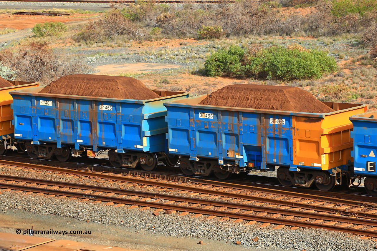 240619 0338
Cape Lambert yard, one of Rio Tinto's blue rakes with spring park brake and only electronic controlled pneumatic [ECP] braking, waggon pair 31466 is a master and is bar coupled to slave waggon 36466 built by China Northen as a Q type in 12/2022. Captured on June 19, 2024.
Keywords: 31466;36466;Q-type;China-Northern;Rio-ore-waggon;