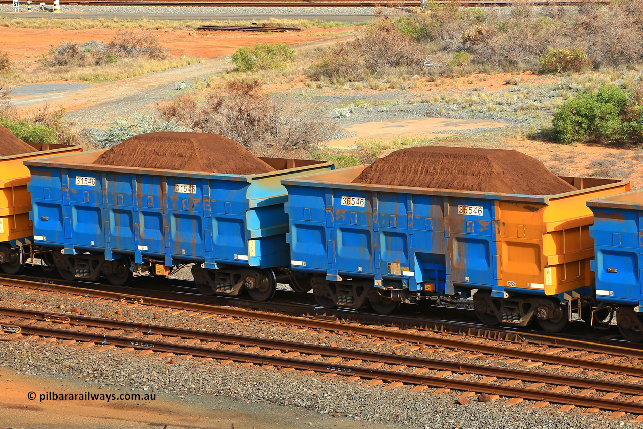 240619 0340
Cape Lambert yard, one of Rio Tinto's blue rakes with spring park brake and only electronic controlled pneumatic [ECP] braking, waggon pair 31546 is a master and is bar coupled to slave waggon 36546 built by China Northen as a Q type in 12/2022. Captured on June 19, 2024.
Keywords: 31546;36546;Q-type;China-Northern;Rio-ore-waggon;