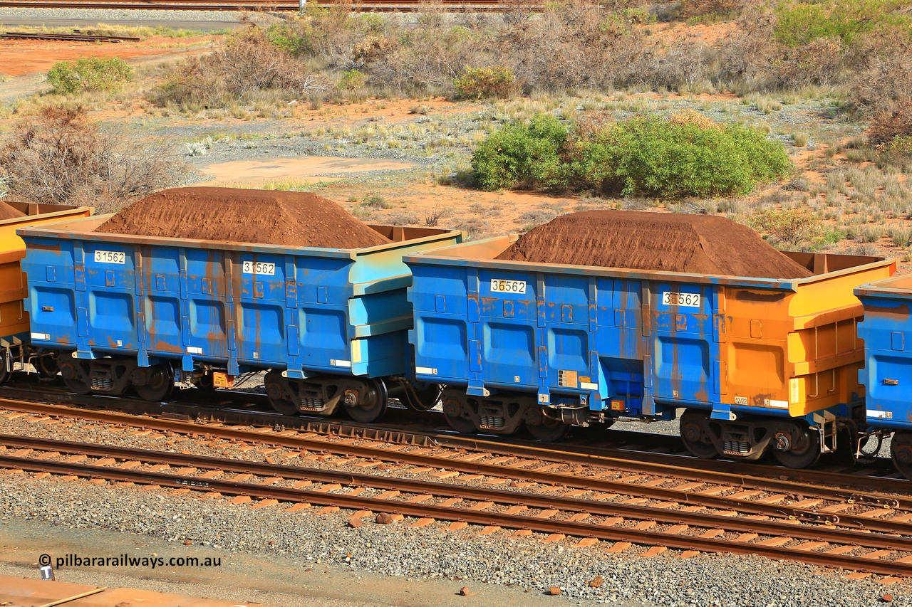 240619 0342
Cape Lambert yard, one of Rio Tinto's blue rakes with spring park brake and only electronic controlled pneumatic [ECP] braking, waggon pair 31562 is a master and is bar coupled to slave waggon 36562 built by China Northen as a Q type in 12/2022. Captured on June 19, 2024.
Keywords: 31562;36562;Q-type;China-Northern;Rio-ore-waggon;