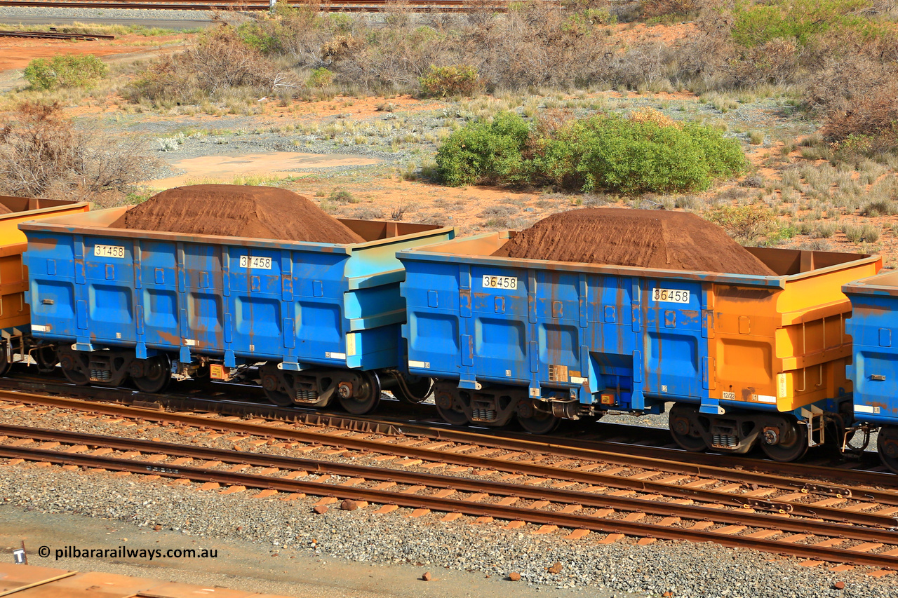 240619 0347
Cape Lambert yard, one of Rio Tinto's blue rakes with spring park brake and only electronic controlled pneumatic [ECP] braking, waggon pair 31458 is a master and is bar coupled to slave waggon 36458 built by China Northen as a Q type in 12/2022. Captured on June 19, 2024.
Keywords: 31458;36458;Q-type;China-Northern;Rio-ore-waggon;