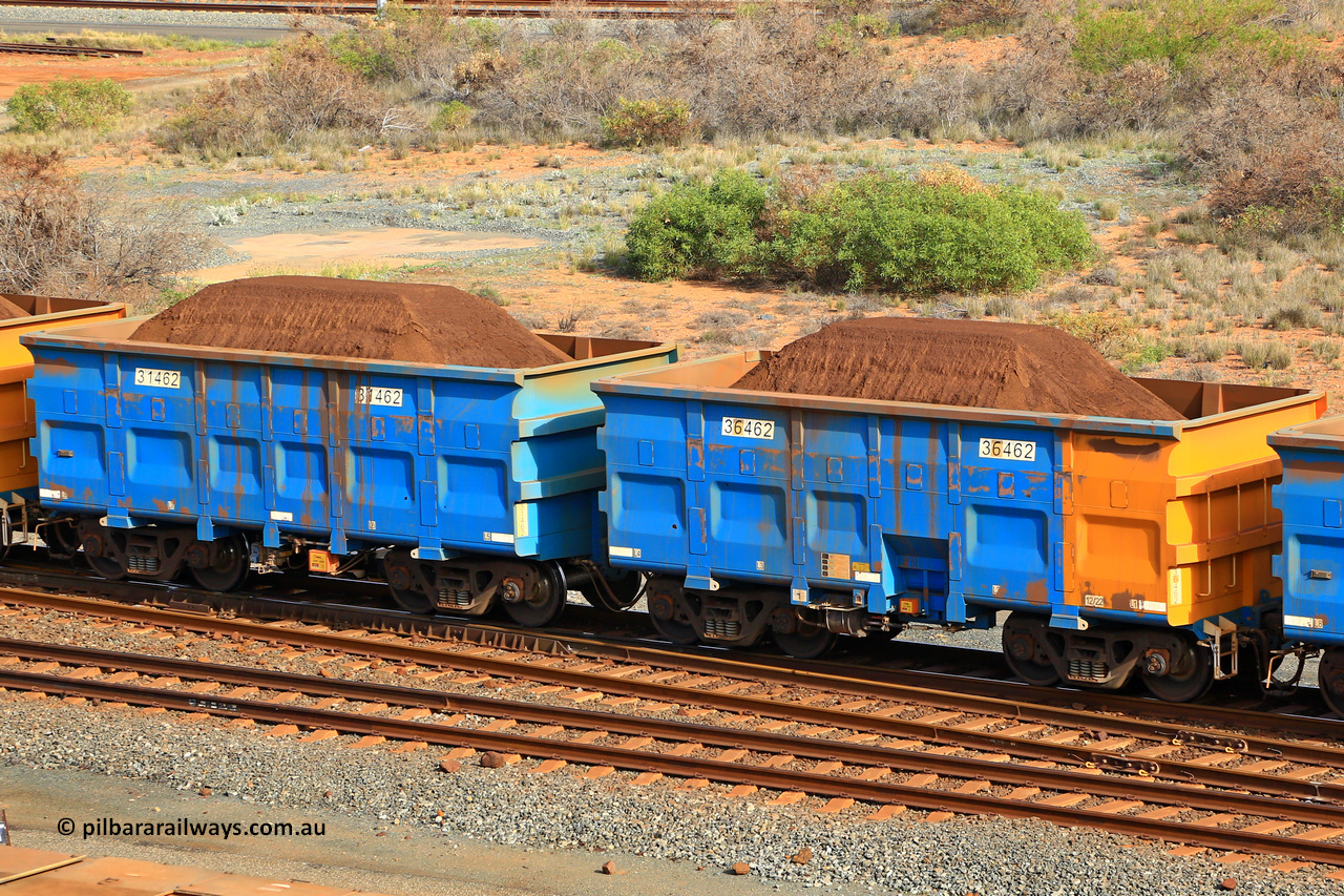 240619 0348
Cape Lambert yard, one of Rio Tinto's blue rakes with spring park brake and only electronic controlled pneumatic [ECP] braking, waggon pair 31462 is a master and is bar coupled to slave waggon 36462 built by China Northen as a Q type in 12/2022. Captured on June 19, 2024.
Keywords: 31462;36462;Q-type;China-Northern;Rio-ore-waggon;