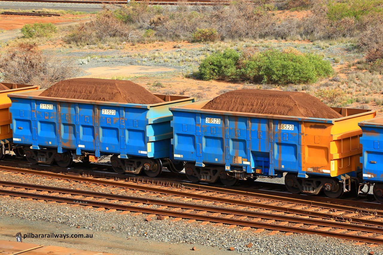 240619 0349
Cape Lambert yard, one of Rio Tinto's blue rakes with spring park brake and only electronic controlled pneumatic [ECP] braking, waggon pair 31523 is a master and is bar coupled to slave waggon 36523 built by China Northen as a Q type in 12/2022. Captured on June 19, 2024.
Keywords: 31523;36523;Q-type;China-Northern;Rio-ore-waggon;
