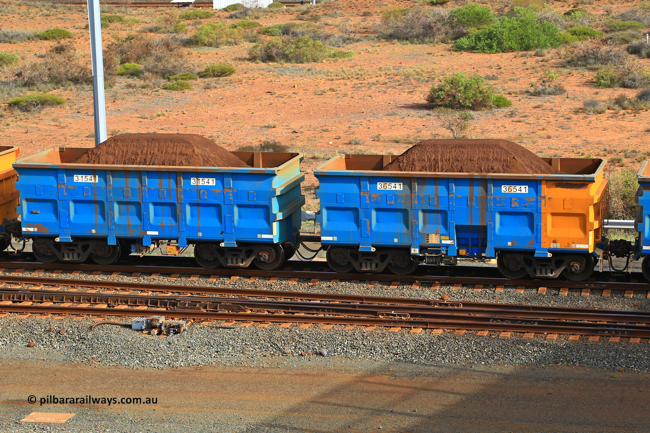 240619 0351
Cape Lambert yard, one of Rio Tinto's blue rakes with spring park brake and only electronic controlled pneumatic [ECP] braking, waggon pair 31541 is a master and is bar coupled to slave waggon 36541 built by China Northen as a Q type in 12/2022. Captured on June 19, 2024.
Keywords: 31541;36541;Q-type;China-Northern;Rio-ore-waggon;