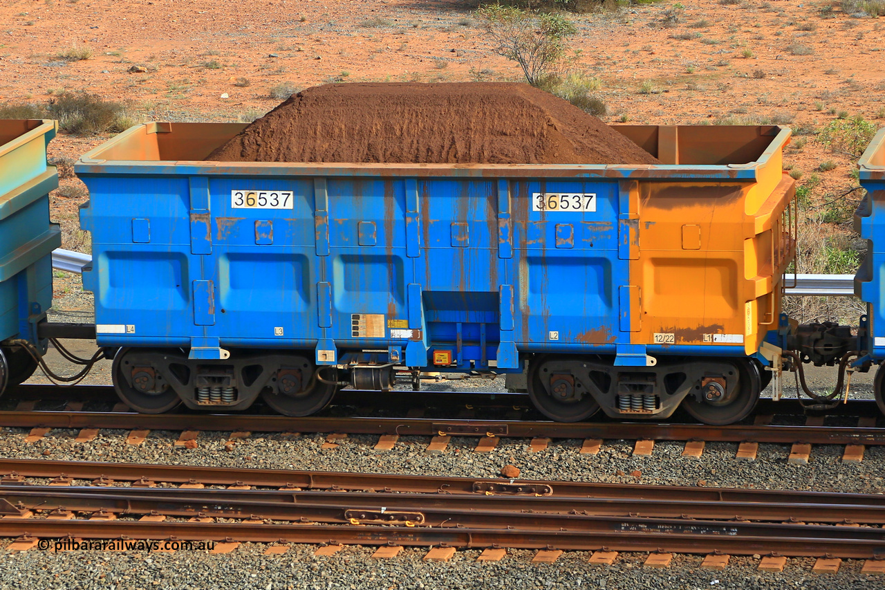 240619 0353
Cape Lambert yard, one of Rio Tinto's blue rakes with spring park brake and only electronic controlled pneumatic [ECP] braking, 36537 is a slave waggon built by China Northen as a Q type in 12/2022. Captured on June 19, 2024.
Keywords: 36537;Q-type;China-Northern;Rio-ore-waggon;