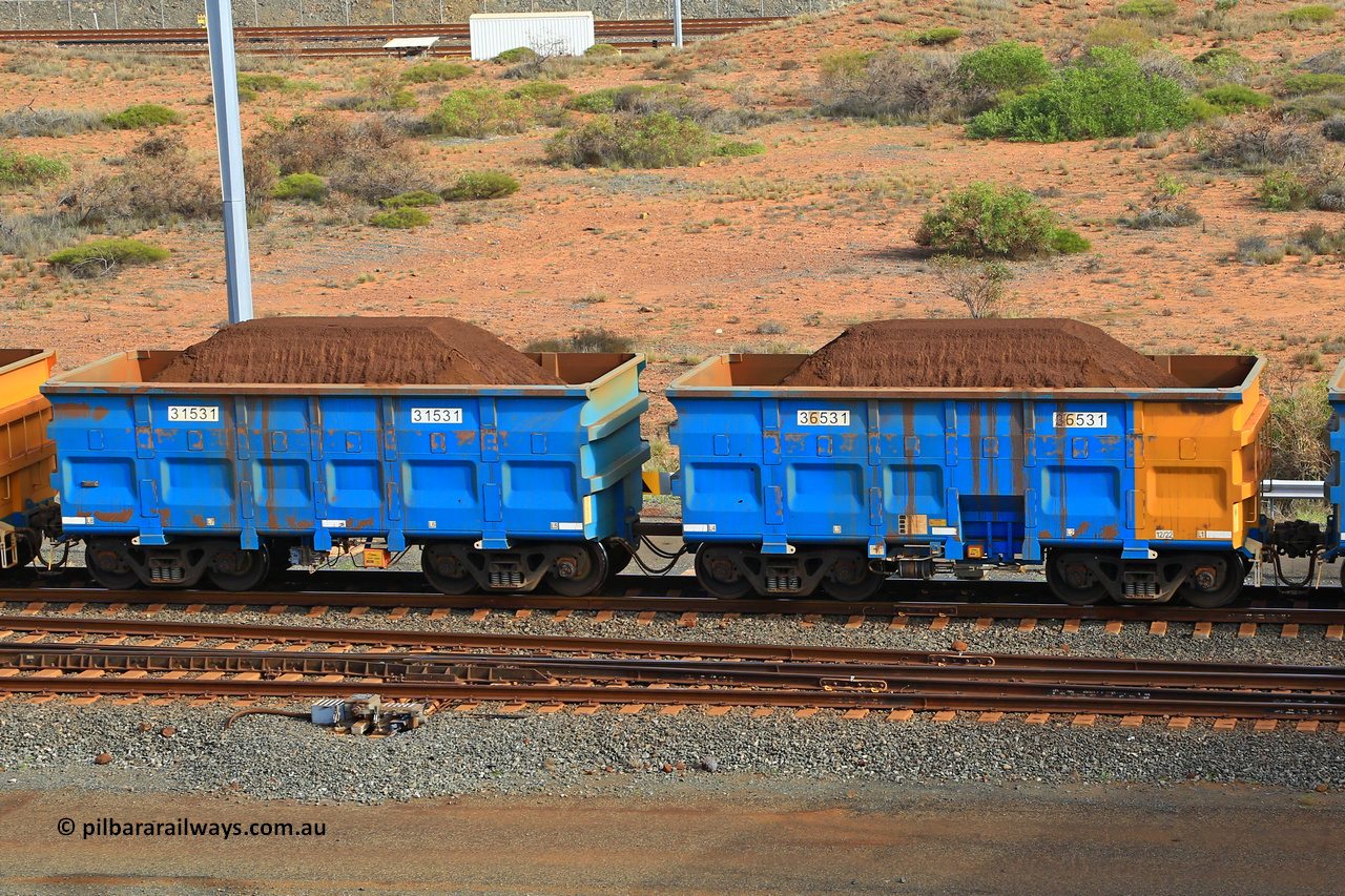 240619 0361
Cape Lambert yard, one of Rio Tinto's blue rakes with spring park brake and only electronic controlled pneumatic [ECP] braking, waggon pair 31531 is a master and is bar coupled to slave waggon 36531 built by China Northen as a Q type in 12/2022. Captured on June 19, 2024.
Keywords: 31531;36531;Q-type;China-Northern;Rio-ore-waggon;