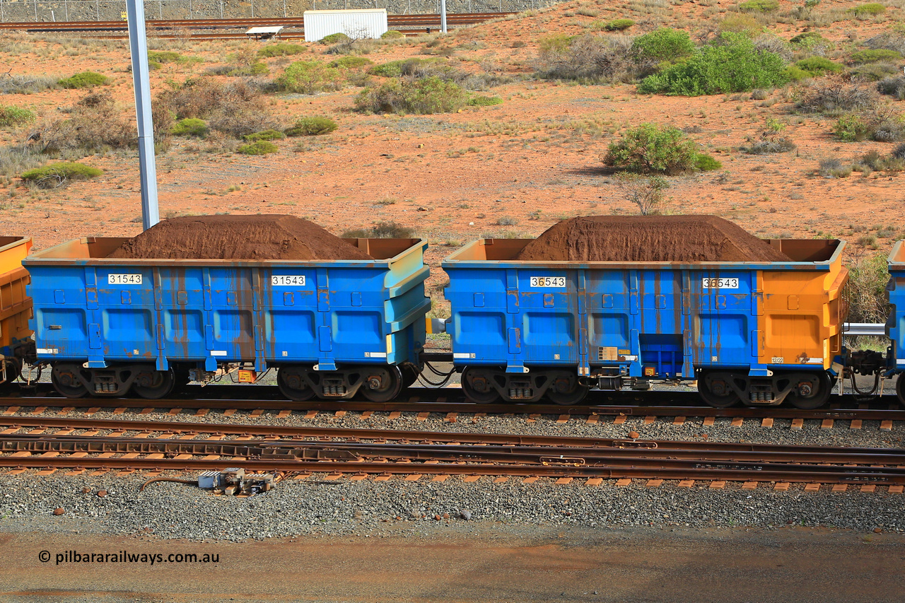 240619 0363
Cape Lambert yard, one of Rio Tinto's blue rakes with spring park brake and only electronic controlled pneumatic [ECP] braking, waggon pair 31543 is a master and is bar coupled to slave waggon 36543 built by China Northen as a Q type in 12/2022. Captured on June 19, 2024.
Keywords: 31543;36543;Q-type;China-Northern;Rio-ore-waggon;