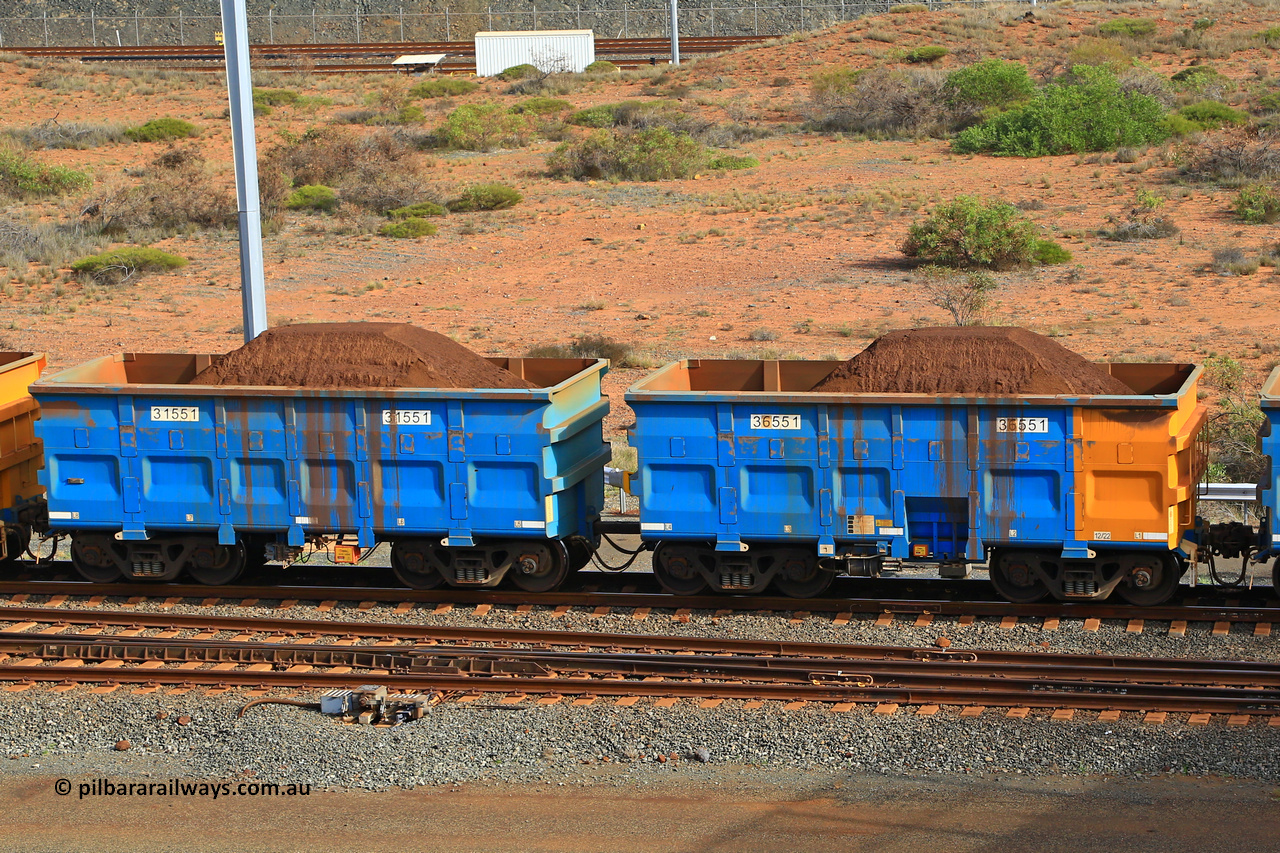 240619 0365
Cape Lambert yard, one of Rio Tinto's blue rakes with spring park brake and only electronic controlled pneumatic [ECP] braking, waggon pair 31551 is a master and is bar coupled to slave waggon 36551 built by China Northen as a Q type in 12/2022. Captured on June 19, 2024.
Keywords: 31551;36551;Q-type;China-Northern;Rio-ore-waggon;