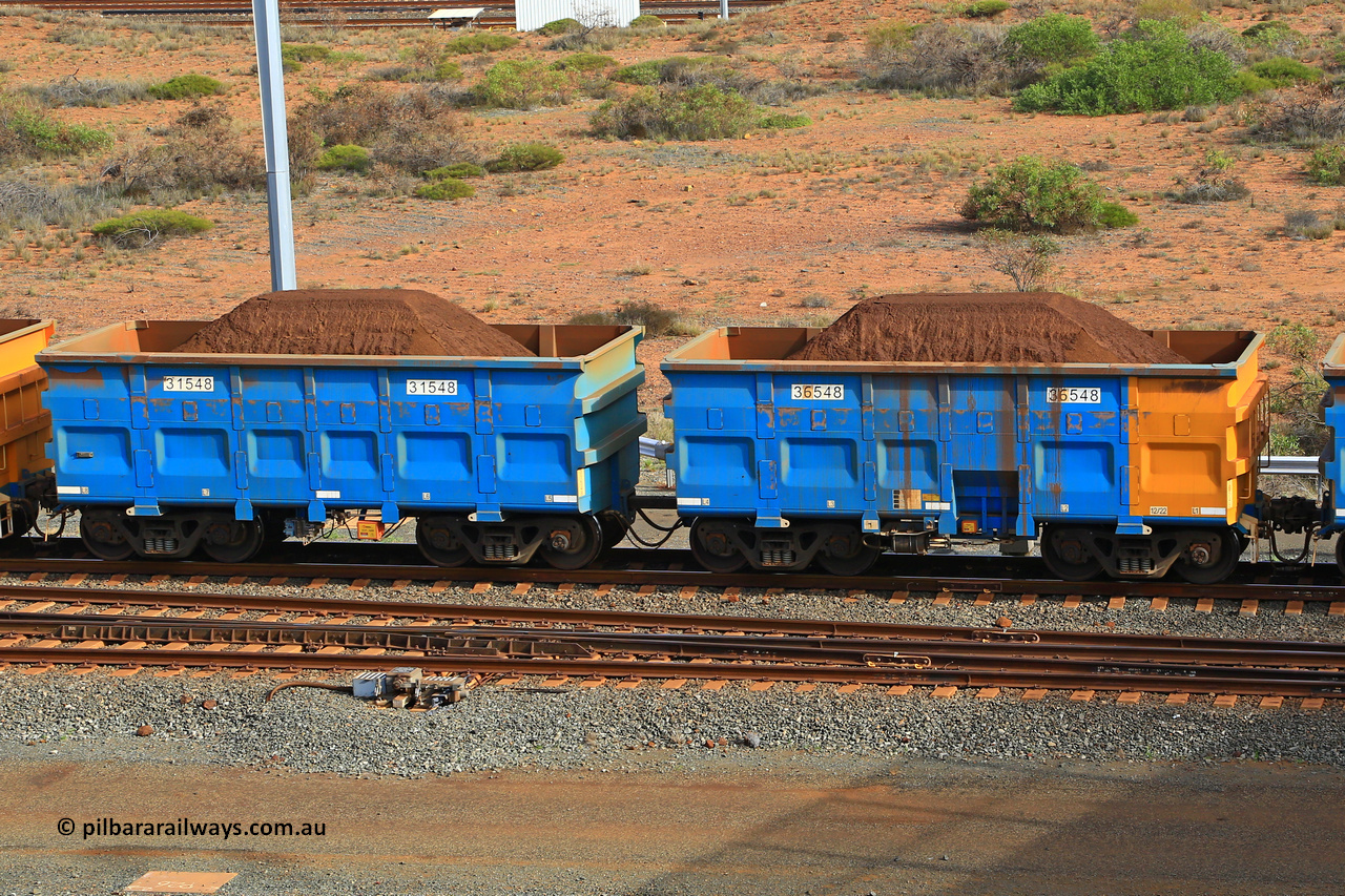 240619 0366
Cape Lambert yard, one of Rio Tinto's blue rakes with spring park brake and only electronic controlled pneumatic [ECP] braking, waggon pair 31548 is a master and is bar coupled to slave waggon 36548 built by China Northen as a Q type in 12/2022. Captured on June 19, 2024.
Keywords: 31548;36548;Q-type;China-Northern;Rio-ore-waggon;