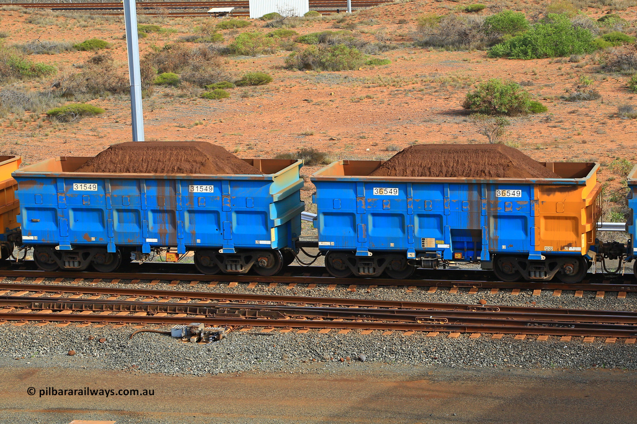240619 0367
Cape Lambert yard, one of Rio Tinto's blue rakes with spring park brake and only electronic controlled pneumatic [ECP] braking, waggon pair 31549 is a master and is bar coupled to slave waggon 36549 built by China Northen as a Q type in 12/2022. Captured on June 19, 2024.
Keywords: 31549;36549;Q-type;China-Northern;Rio-ore-waggon;