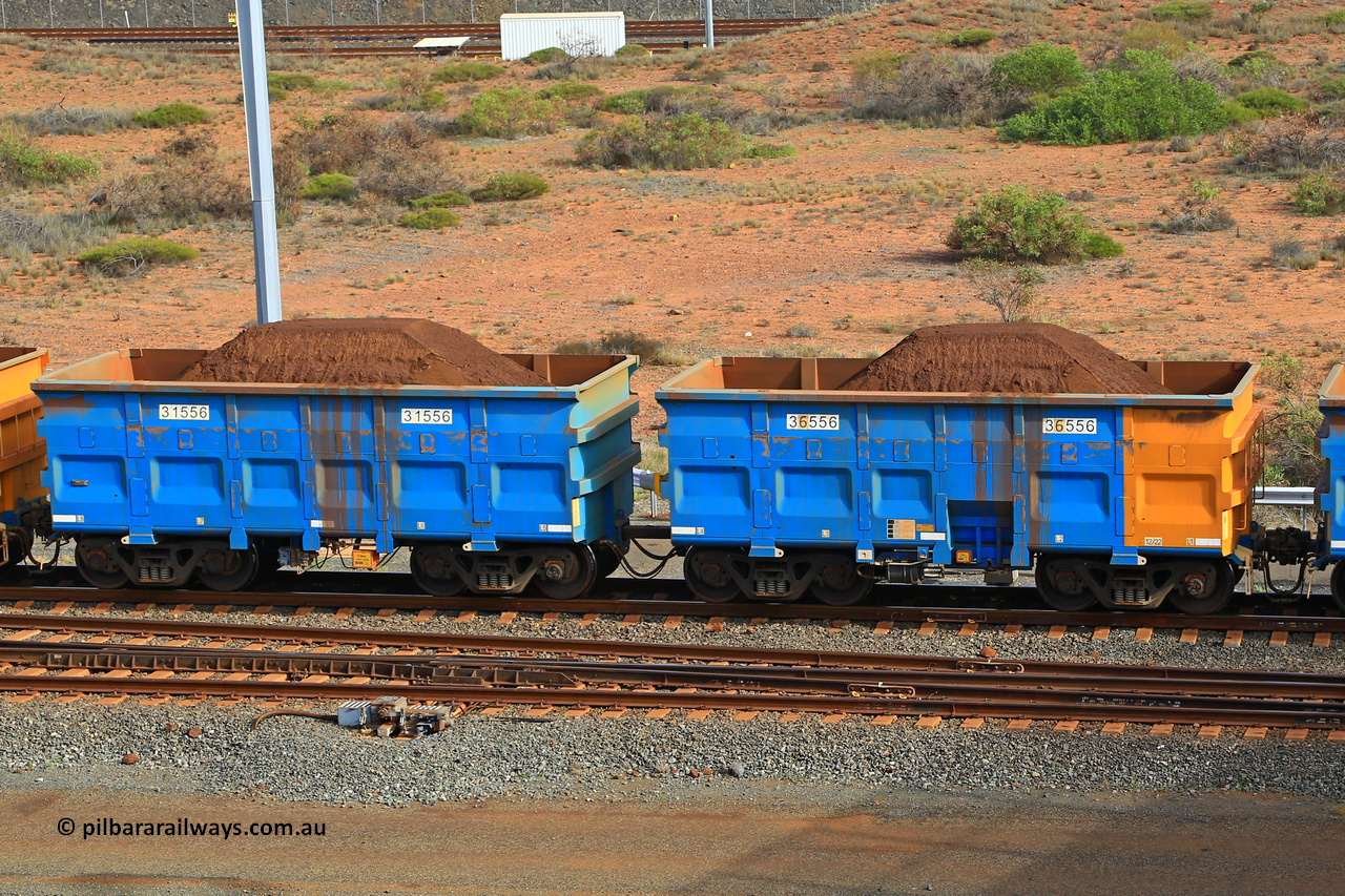 240619 0369
Cape Lambert yard, one of Rio Tinto's blue rakes with spring park brake and only electronic controlled pneumatic [ECP] braking, waggon pair 31556 is a master and is bar coupled to slave waggon 36556 built by China Northen as a Q type in 12/2022. Captured on June 19, 2024.
Keywords: 31556;36556;Q-type;China-Northern;Rio-ore-waggon;