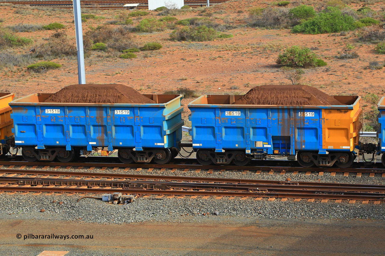 240619 0370
Cape Lambert yard, one of Rio Tinto's blue rakes with spring park brake and only electronic controlled pneumatic [ECP] braking, waggon pair 31519 is a master and is bar coupled to slave waggon 36519 built by China Northen as a Q type in 12/2022. Captured on June 19, 2024.
Keywords: 31519;36519;Q-type;China-Northern;Rio-ore-waggon;