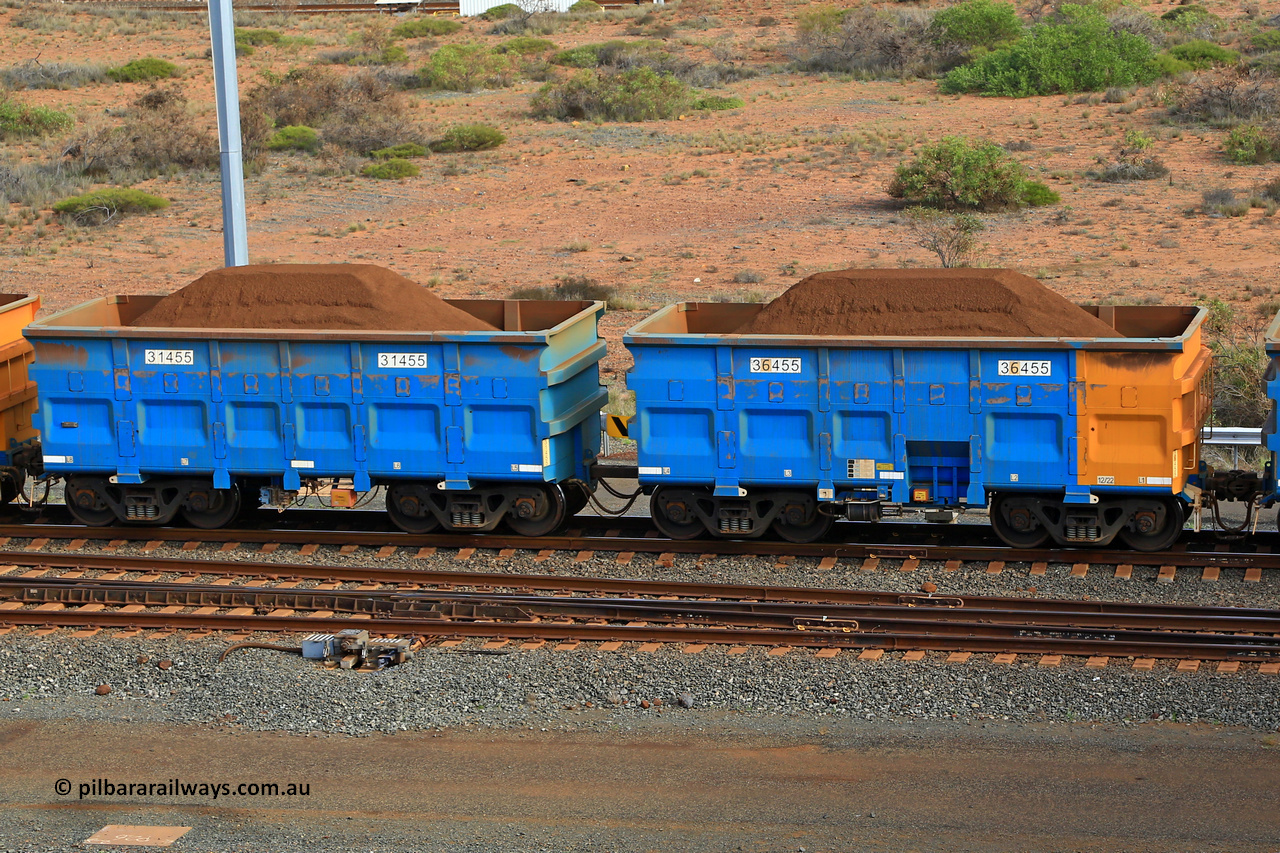 240619 0379
Cape Lambert yard, one of Rio Tinto's blue rakes with spring park brake and only electronic controlled pneumatic [ECP] braking, waggon pair 31455 is a master and is bar coupled to slave waggon 36455 built by China Northen as a Q type in 12/2022. Captured on June 19, 2024.
Keywords: 31455;36455;Q-type;China-Northern;Rio-ore-waggon;