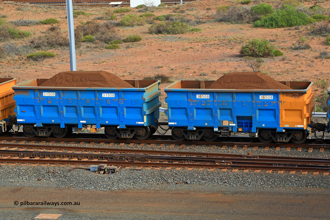 240619 0380
Cape Lambert yard, one of Rio Tinto's blue rakes with spring park brake and only electronic controlled pneumatic [ECP] braking, waggon pair 31508 is a master and is bar coupled to slave waggon 36508 built by China Northen as a Q type in 12/2022. Captured on June 19, 2024.
Keywords: 31508;36508;Q-type;China-Northern;Rio-ore-waggon;