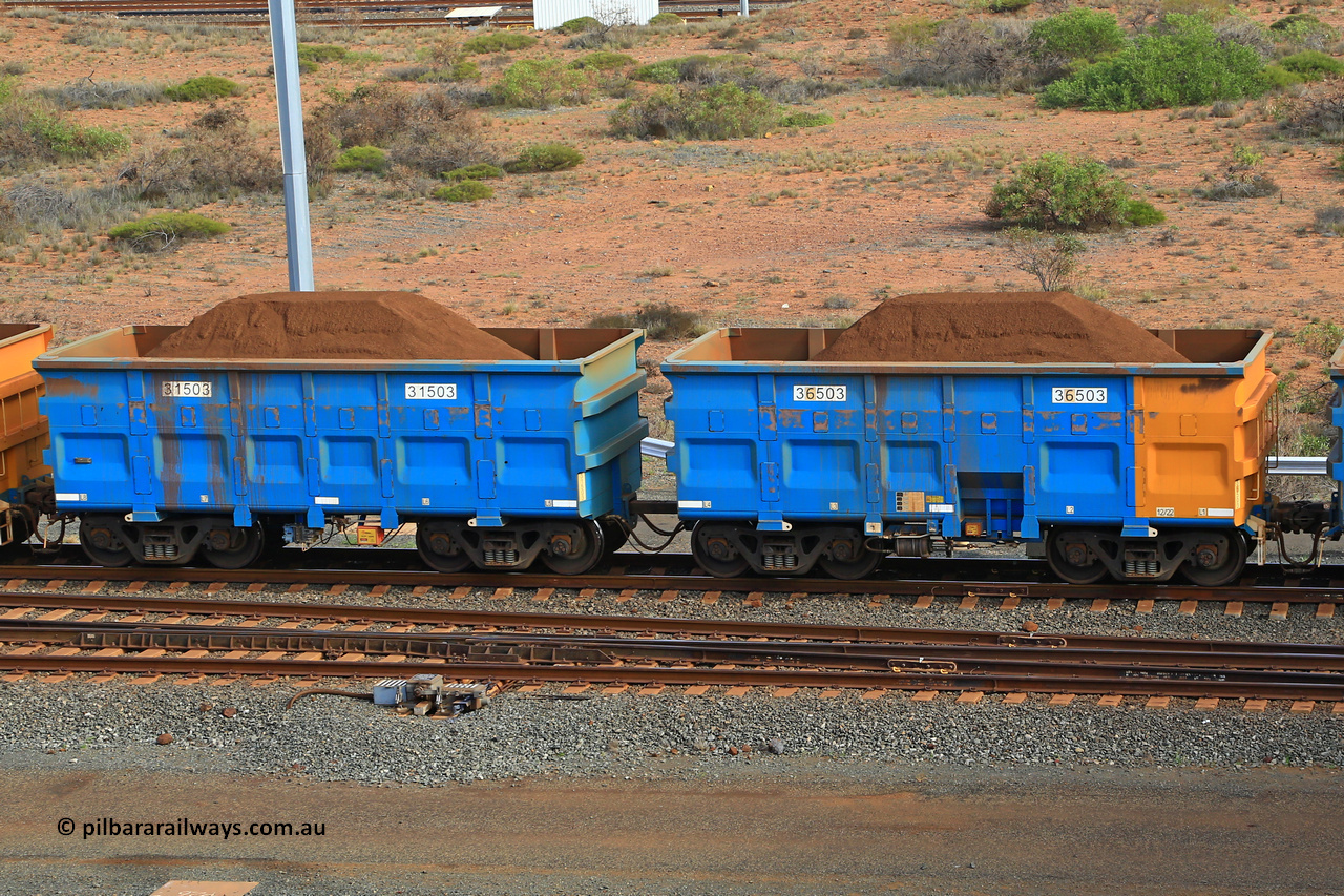 240619 0384
Cape Lambert yard, one of Rio Tinto's blue rakes with spring park brake and only electronic controlled pneumatic [ECP] braking, waggon pair 31503 is a master and is bar coupled to slave waggon 36503 built by China Northen as a Q type in 12/2022. Captured on June 19, 2024.
Keywords: 31503;36503;Q-type;China-Northern;Rio-ore-waggon;