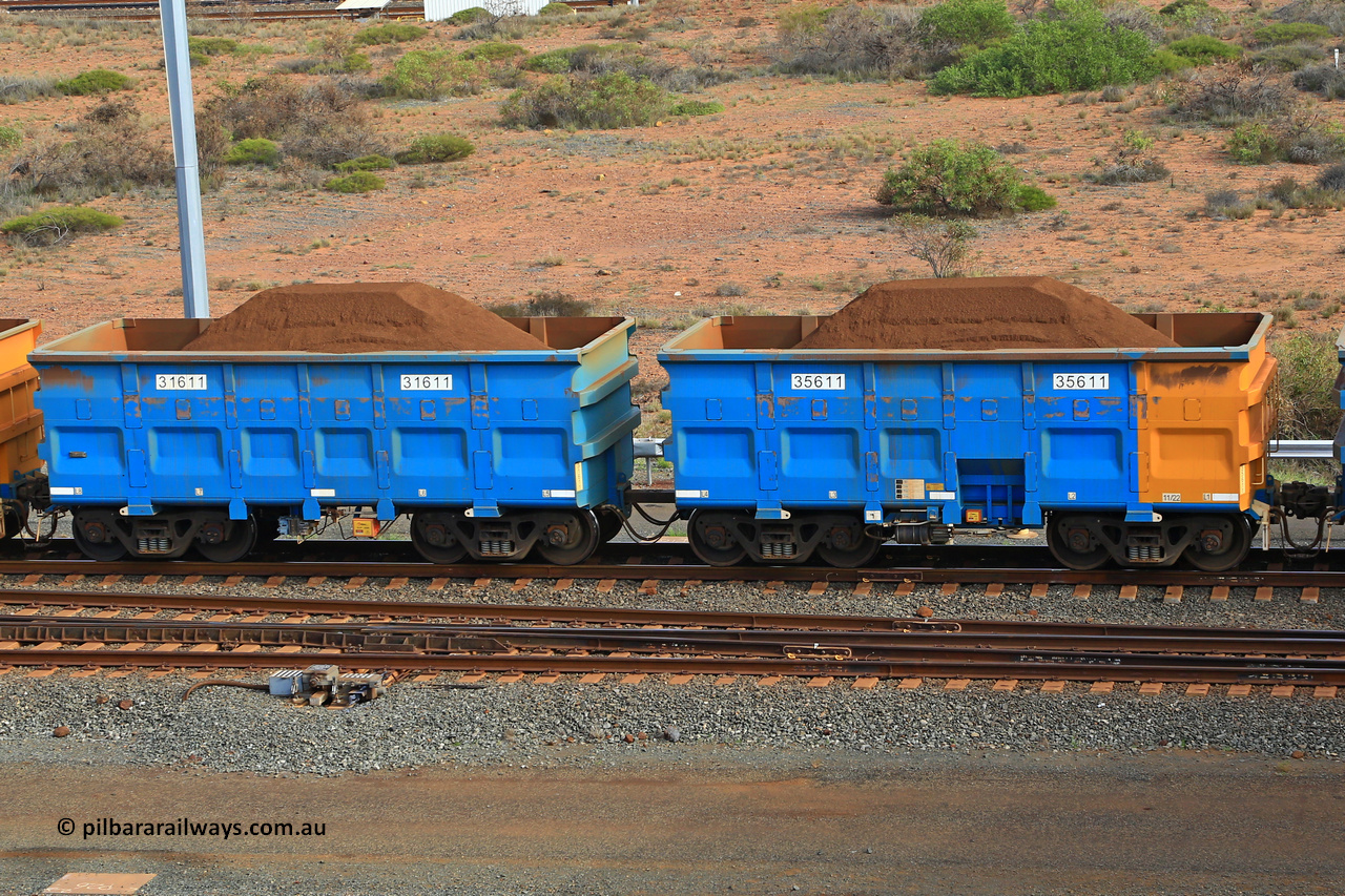 240619 0389
Cape Lambert yard, one of Rio Tinto's blue rakes with spring park brake and only electronic controlled pneumatic [ECP] braking, waggon pair 31611 is a master and is bar coupled to slave waggon 35611 built by China Northen as a Q type in 11/2022. Captured on June 19, 2024.
Keywords: 31611;35611;Q-type;China-Northern;Rio-ore-waggon;