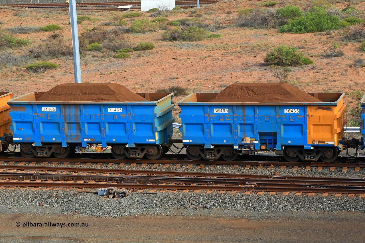 240619 0391
Cape Lambert yard, one of Rio Tinto's blue rakes with spring park brake and only electronic controlled pneumatic [ECP] braking, waggon pair 31465 is a master and is bar coupled to slave waggon 36465 built by China Northen as a Q type in 12/2022. Captured on June 19, 2024.
Keywords: 31465;36465;Q-type;China-Northern;Rio-ore-waggon;