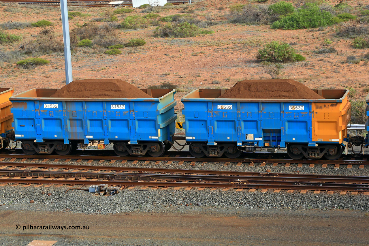 240619 0394
Cape Lambert yard, one of Rio Tinto's blue rakes with spring park brake and only electronic controlled pneumatic [ECP] braking, waggon pair 31532 is a master and is bar coupled to slave waggon 36532 built by China Northen as a Q type in 12/2022. Captured on June 19, 2024.
Keywords: 31532;36532;Q-type;China-Northern;Rio-ore-waggon;