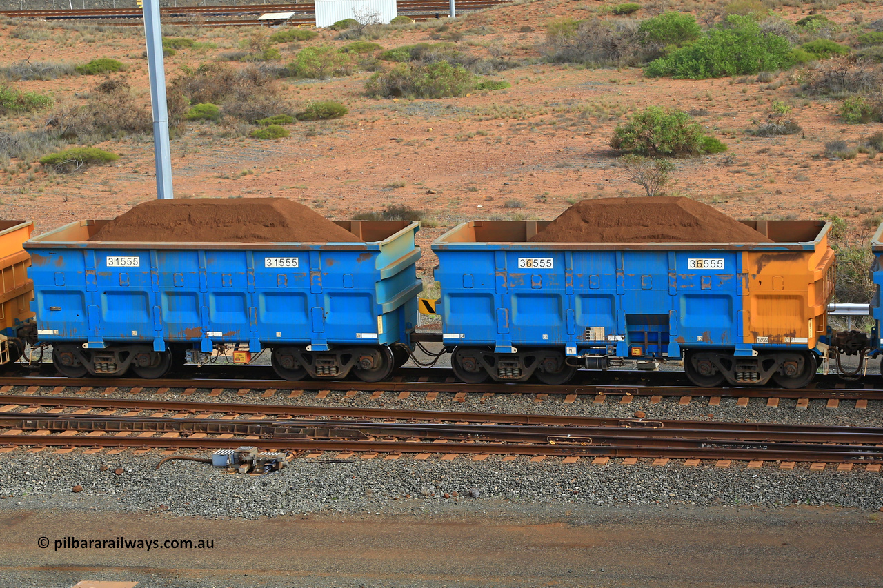 240619 0395
Cape Lambert yard, one of Rio Tinto's blue rakes with spring park brake and only electronic controlled pneumatic [ECP] braking, waggon pair 31555 is a master and is bar coupled to slave waggon 36555 built by China Northen as a Q type in 12/2022. Captured on June 19, 2024.
Keywords: 31555;36555;Q-type;China-Northern;Rio-ore-waggon;