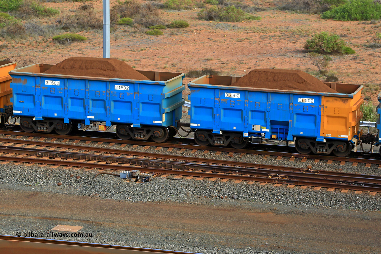 240619 0401
Cape Lambert yard, one of Rio Tinto's blue rakes with spring park brake and only electronic controlled pneumatic [ECP] braking, waggon pair 31502 is a master and is bar coupled to slave waggon 36502 built by China Northen as a Q type in 12/2022. Captured on June 19, 2024.
Keywords: 31502;36502;Q-type;China-Northern;Rio-ore-waggon;