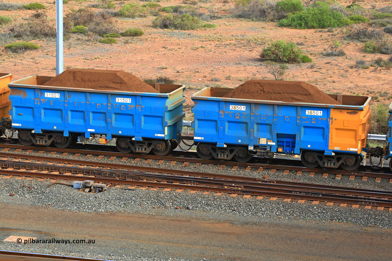 240619 0404
Cape Lambert yard, one of Rio Tinto's blue rakes with spring park brake and only electronic controlled pneumatic [ECP] braking, waggon pair 31501 is a master and is bar coupled to slave waggon 36501 built by China Northen as a Q type in 12/2022. Captured on June 19, 2024.
Keywords: 31501;36501;Q-type;China-Northern;Rio-ore-waggon;