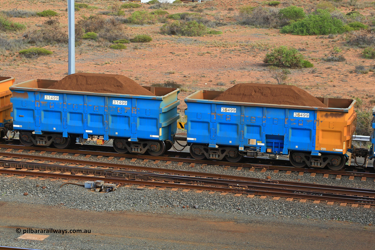 240619 0405
Cape Lambert yard, one of Rio Tinto's blue rakes with spring park brake and only electronic controlled pneumatic [ECP] braking, waggon pair 31499 is a master and is bar coupled to slave waggon 36499 built by China Northen as a Q type in 12/2022. Captured on June 19, 2024.
Keywords: 31499;36499;Q-type;China-Northern;Rio-ore-waggon;