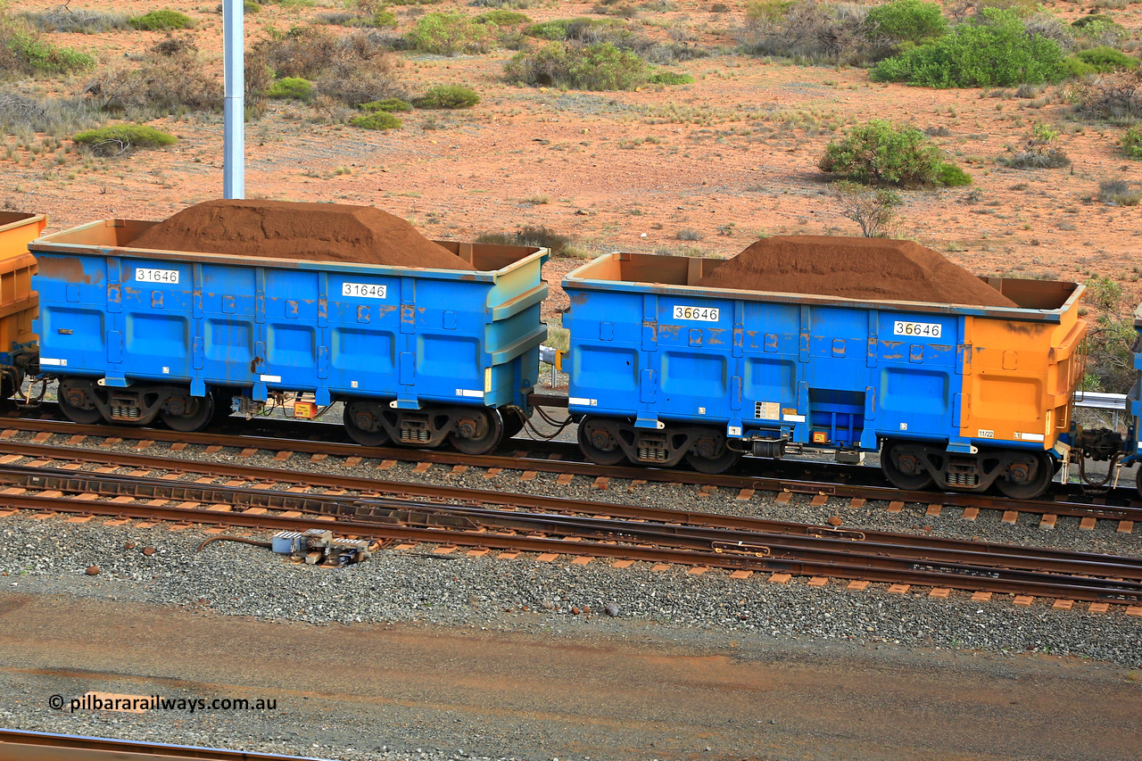 240619 0414
Cape Lambert yard, one of Rio Tinto's blue rakes with spring park brake and only electronic controlled pneumatic [ECP] braking, waggon pair 31646 is a master and is bar coupled to slave waggon 36646 built by China Northen as a Q type in 11/2022. Captured on June 19, 2024.
Keywords: 31646;36646;Q-type;China-Northern;Rio-ore-waggon;