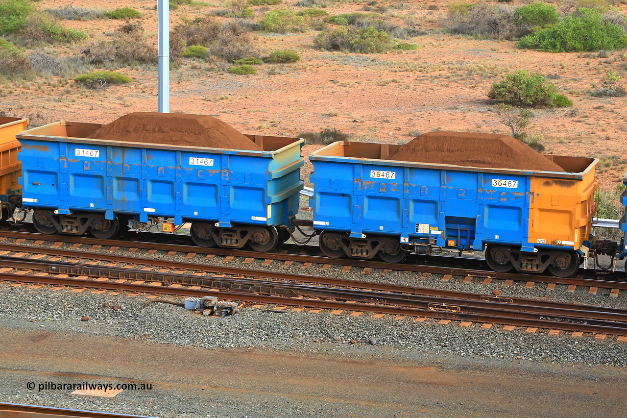 240619 0420
Cape Lambert yard, one of Rio Tinto's blue rakes with spring park brake and only electronic controlled pneumatic [ECP] braking, waggon pair 31467 is a master and is bar coupled to slave waggon 36467 built by China Northen as a Q type in 12/2022. Captured on June 19, 2024.
Keywords: 31467;36467;Q-type;China-Northern;Rio-ore-waggon;